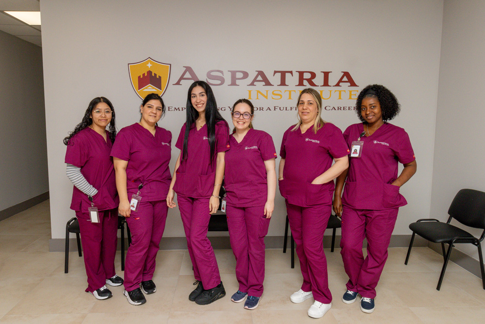 Phlebotomy student drawing blood in lab